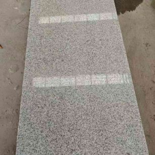 揭阳芝麻白光面毛板